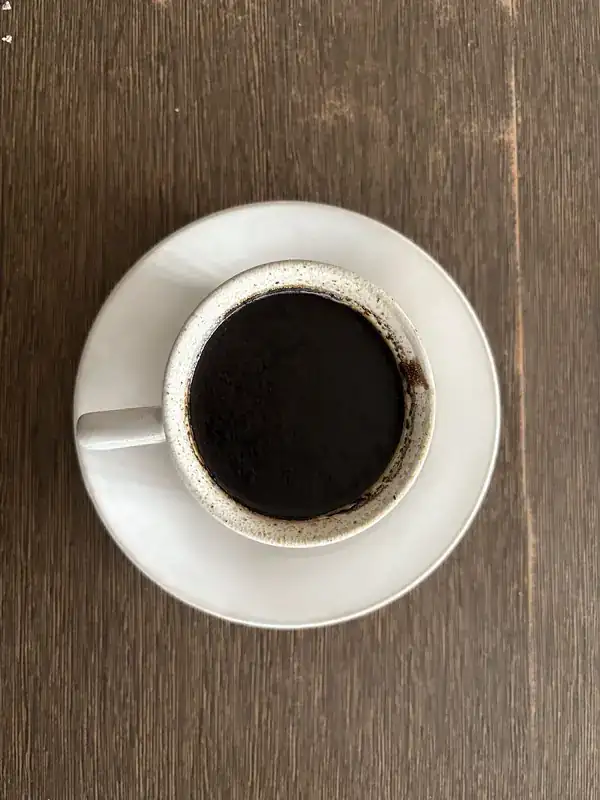 Black espresso on a wooden table