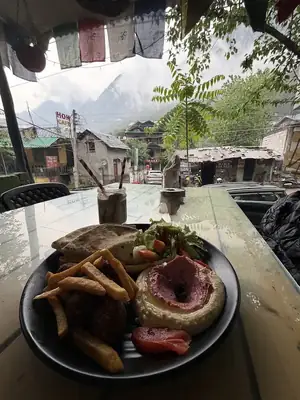 Falafel & hummus plate with mountain view