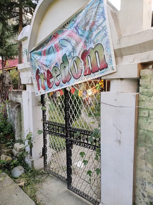 'Freedom' painted gate at the cafe entrance